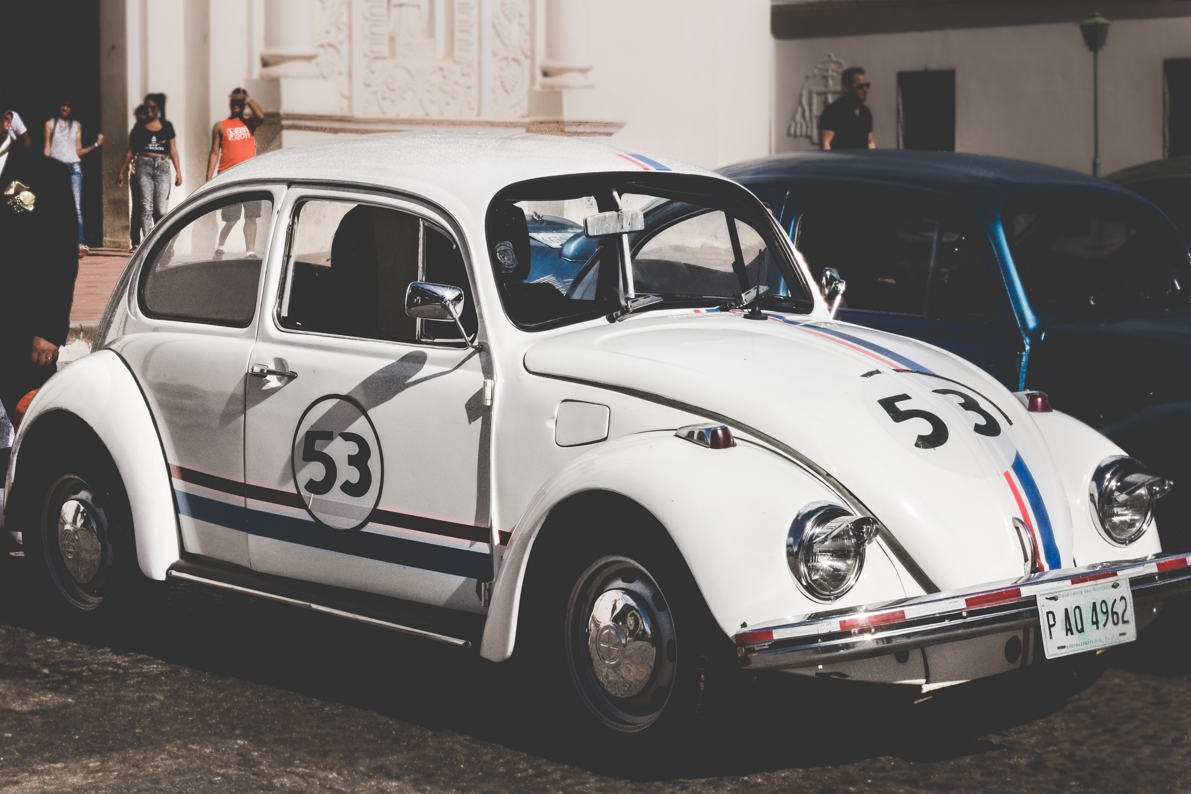 Beetle Numbered 53 With Stripes Showcased On The Street - Herbie The Love Bug Timeline , HD Wallpaper & Backgrounds