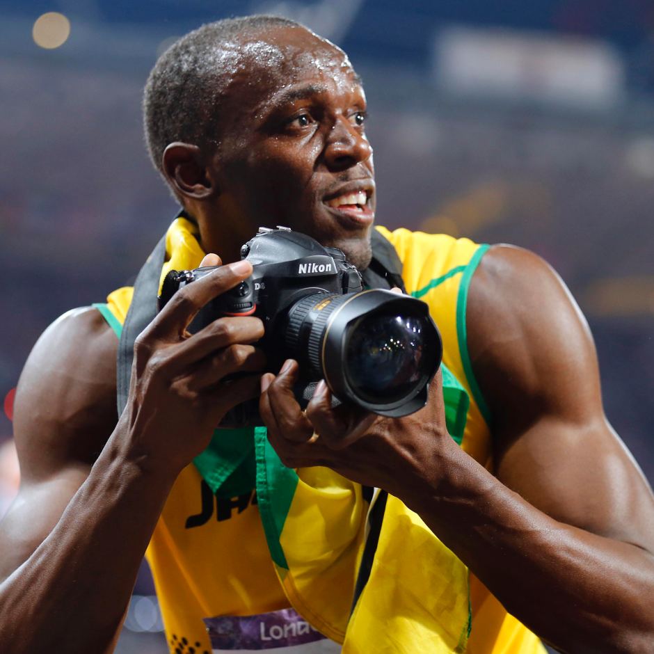 Usain Bolt Turns Photographer - Usain Bolt With Camera , HD Wallpaper & Backgrounds
