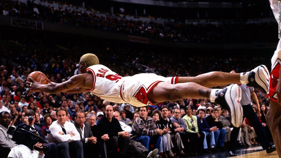 Rodman Dives For A Loose Ball During A Game In - Dennis Rodman Laying Out , HD Wallpaper & Backgrounds