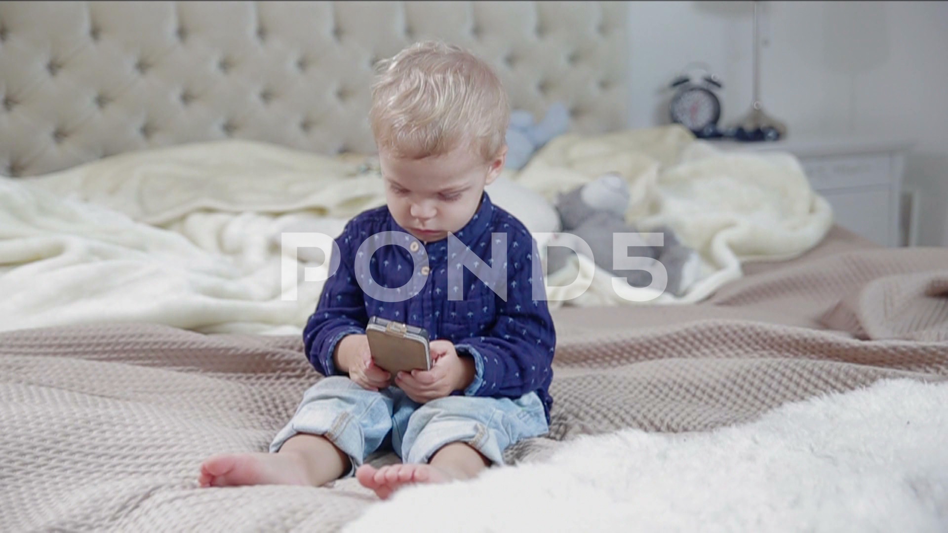 Cute Little Boy Is Using A Smart Phone - Sitting , HD Wallpaper & Backgrounds