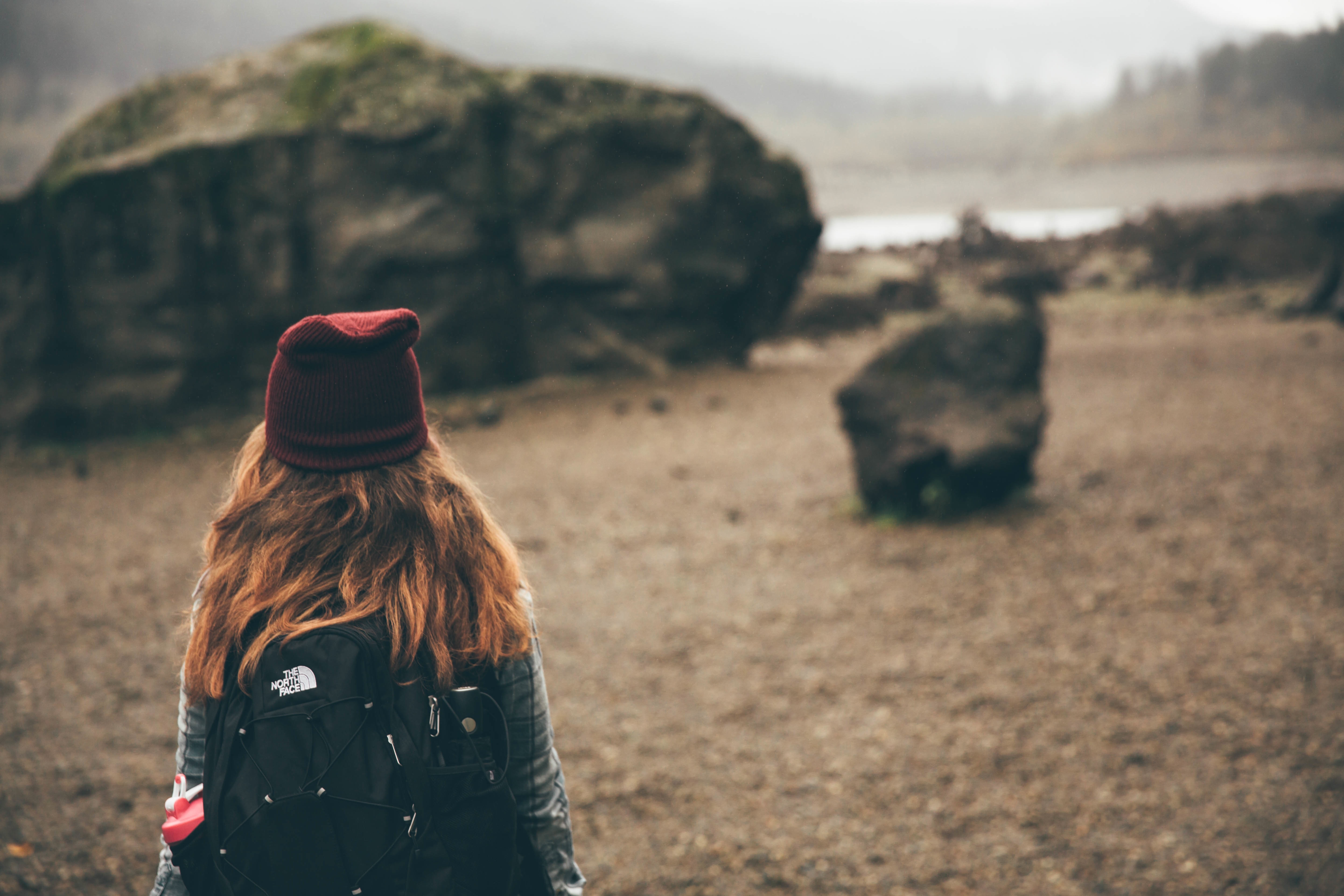 Woman Wearing Black The North Face Backpack And Maroon - Wearing The North Face Backpack , HD Wallpaper & Backgrounds