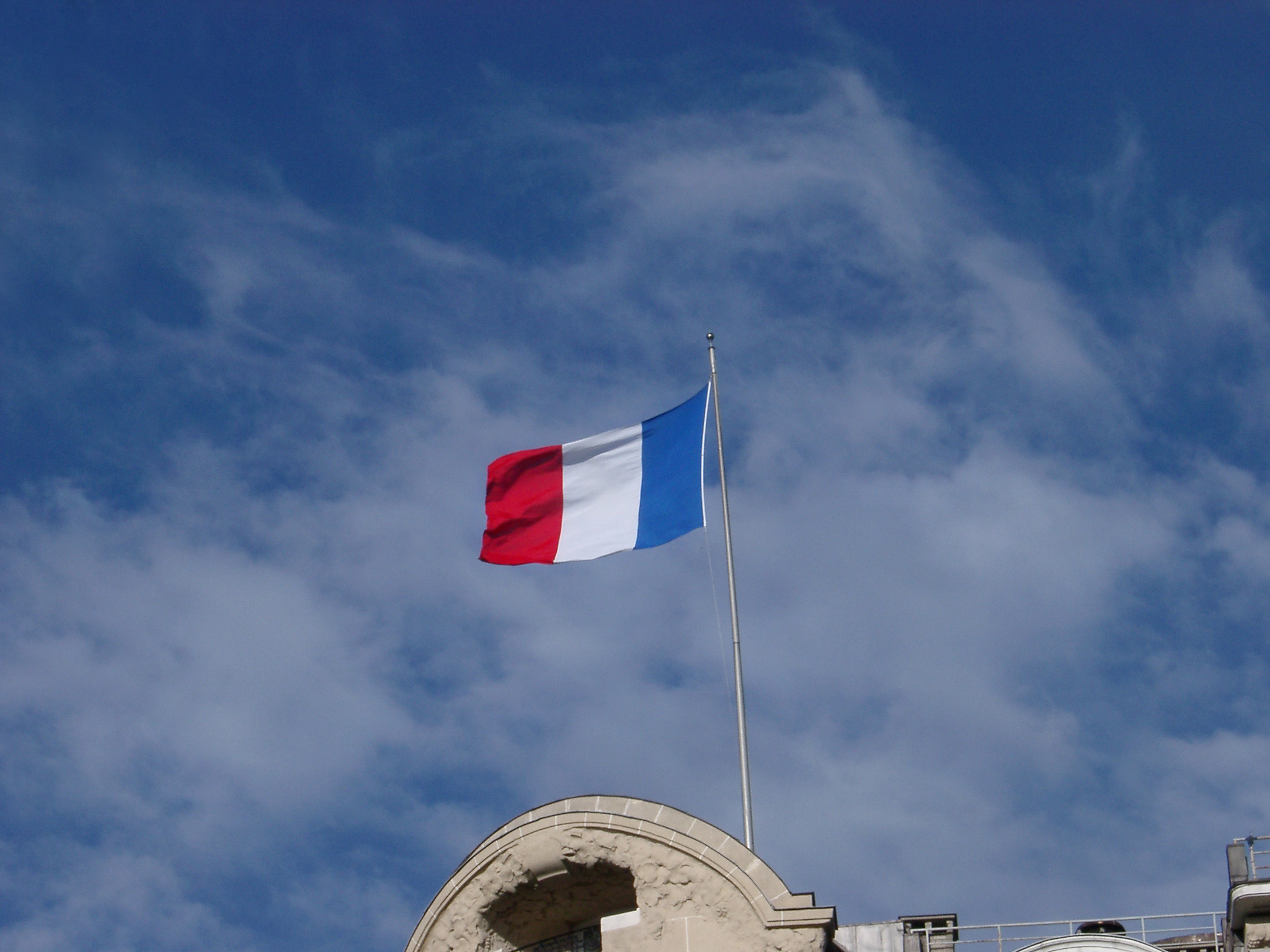 The Tricolor Or French National Flag Flying From A - Flying French Flag , HD Wallpaper & Backgrounds