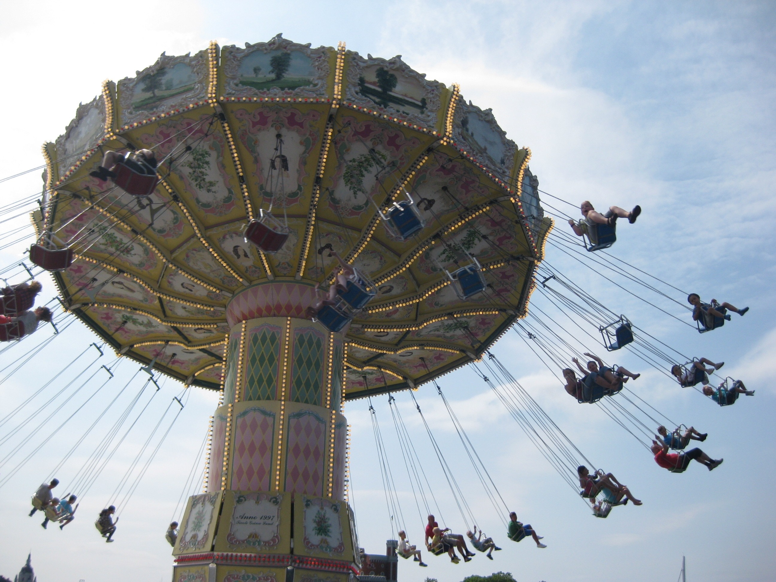 People Riding Flying Fiesta Theme Park Ride Amusement Park (1971330
