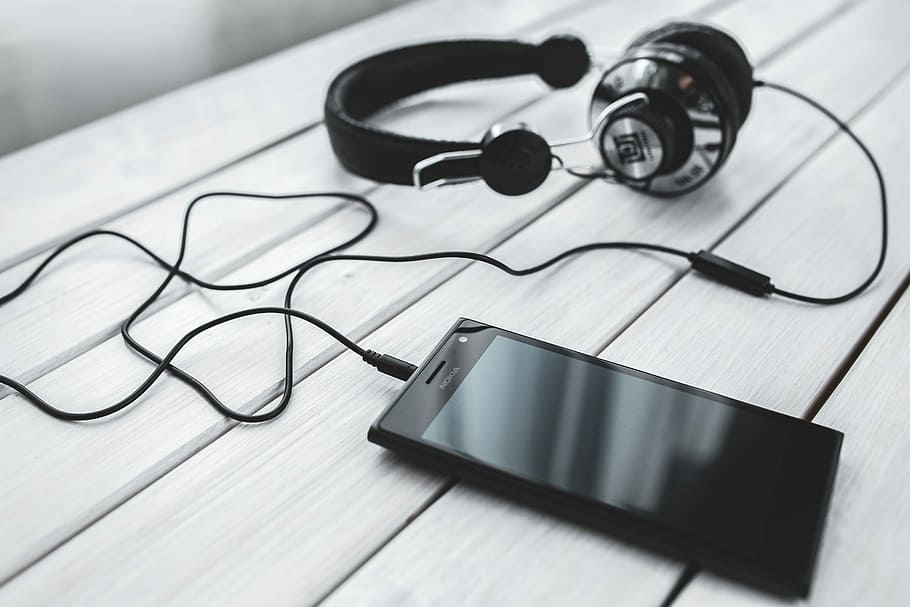 Black Smartphone And Headphones With Various Items, - Music Listening , HD Wallpaper & Backgrounds