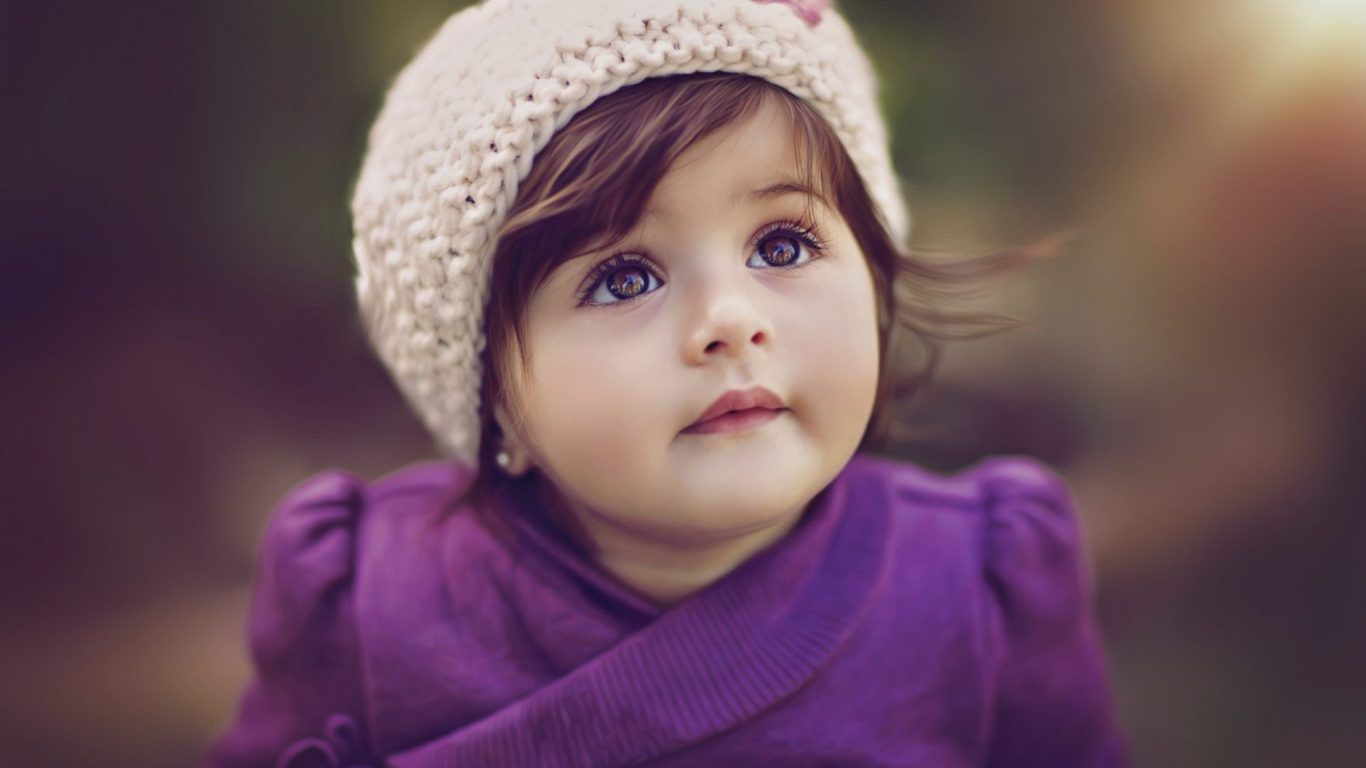 cute baby girl in purple dress