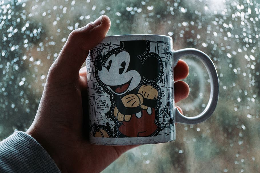 Disney Mickey Mouse Mug, Human Hand, One Person, Human - Sad Cartoon , HD Wallpaper & Backgrounds