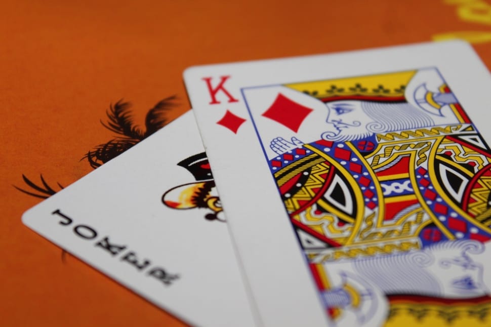 Joker And King Of Diamond Playing Card On Orange Surface - Playing Card Joker And King , HD Wallpaper & Backgrounds
