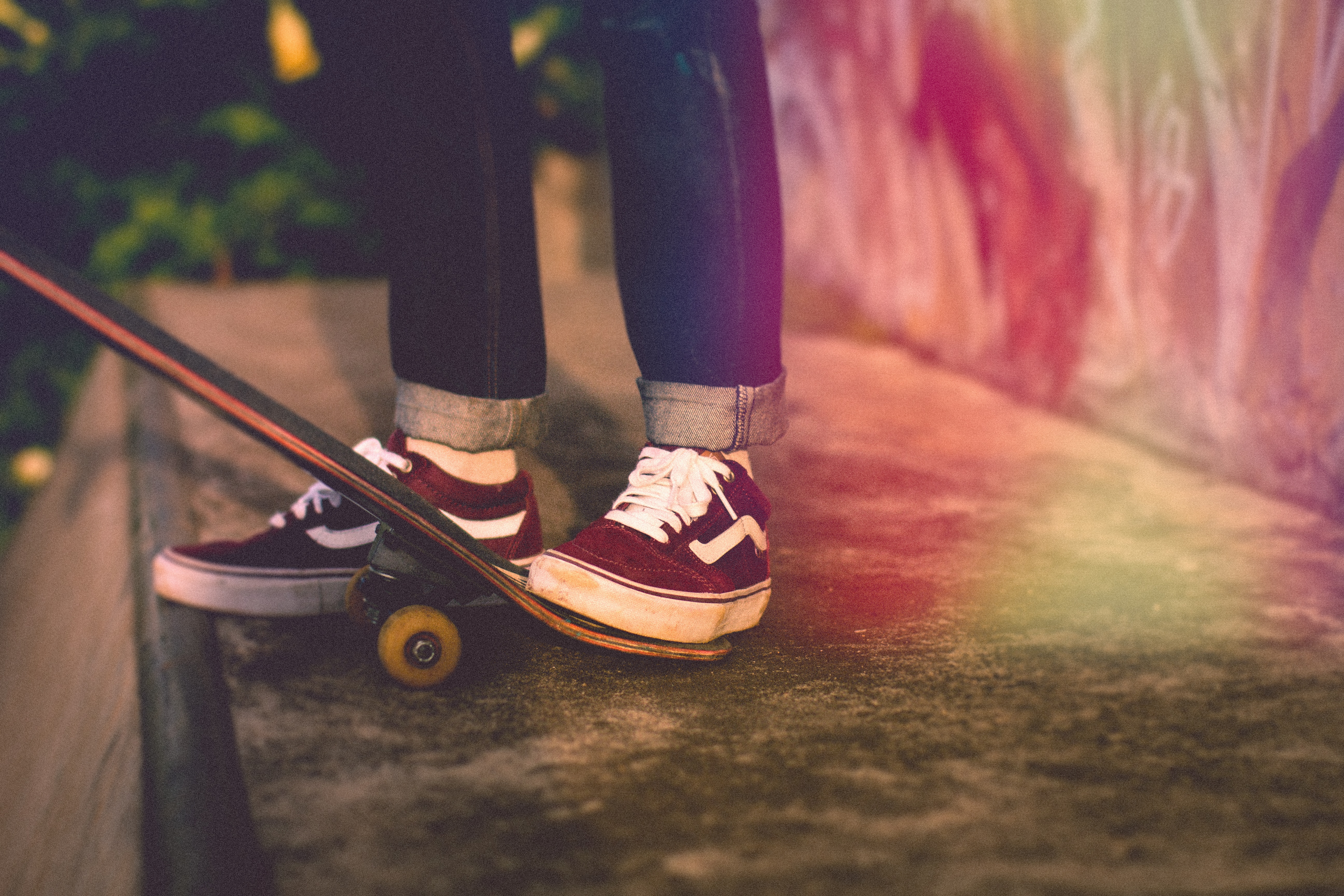 Person On Black Denim Jeans And Vans Sk8 Low Stepping - Skateboard Vans , HD Wallpaper & Backgrounds