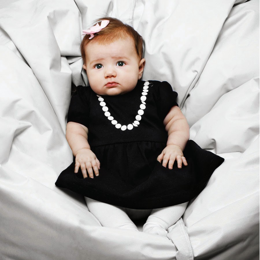baby in black dress