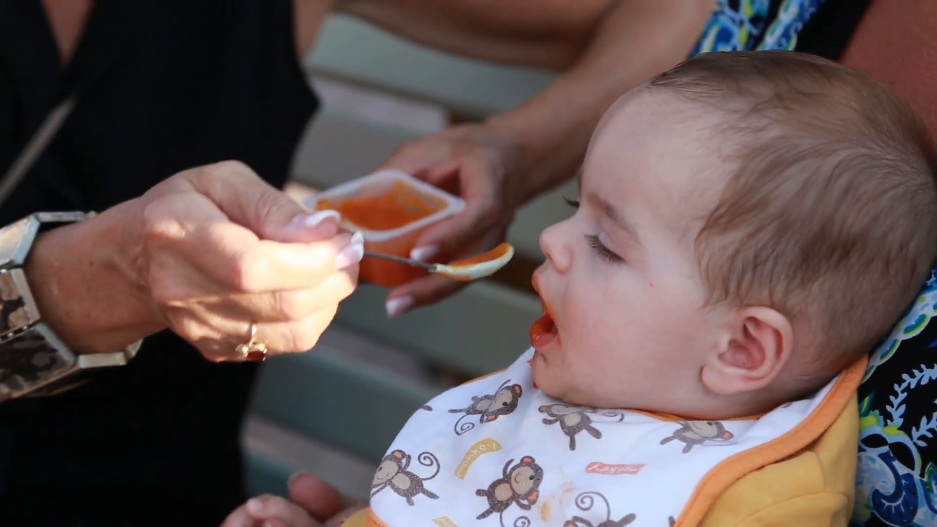 A Woman Spoon-feeds Baby Food To A Baby Boy - Eating , HD Wallpaper & Backgrounds