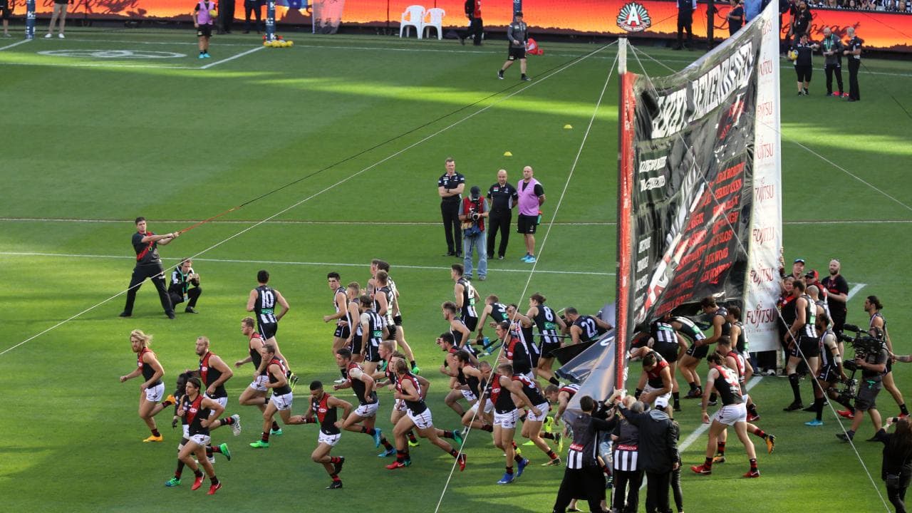The Bombers And Magpies Run Through A Shared Banner - Anzac Day Afl 2019 , HD Wallpaper & Backgrounds