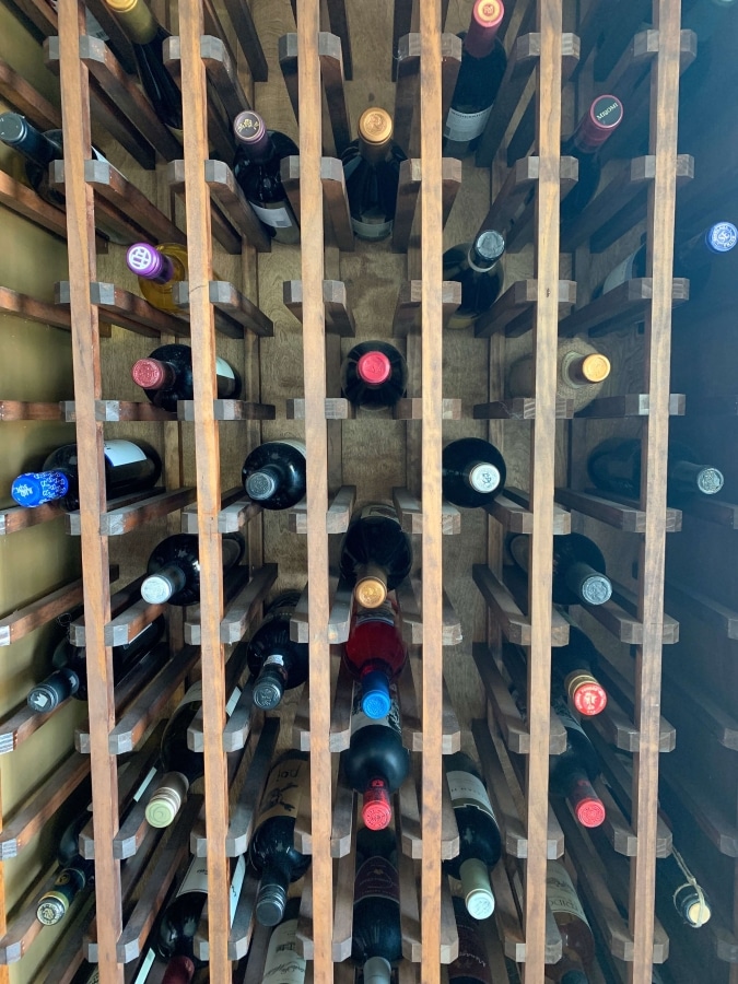 Wine Rack Of Cheap Wines Under $10 - Wine Bottle , HD Wallpaper & Backgrounds